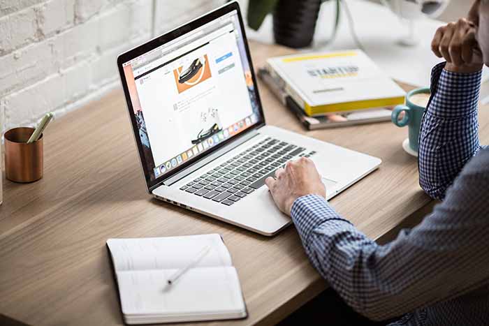 Student studying at laptop.