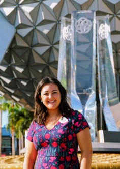 Brown smiling in front of Epcot