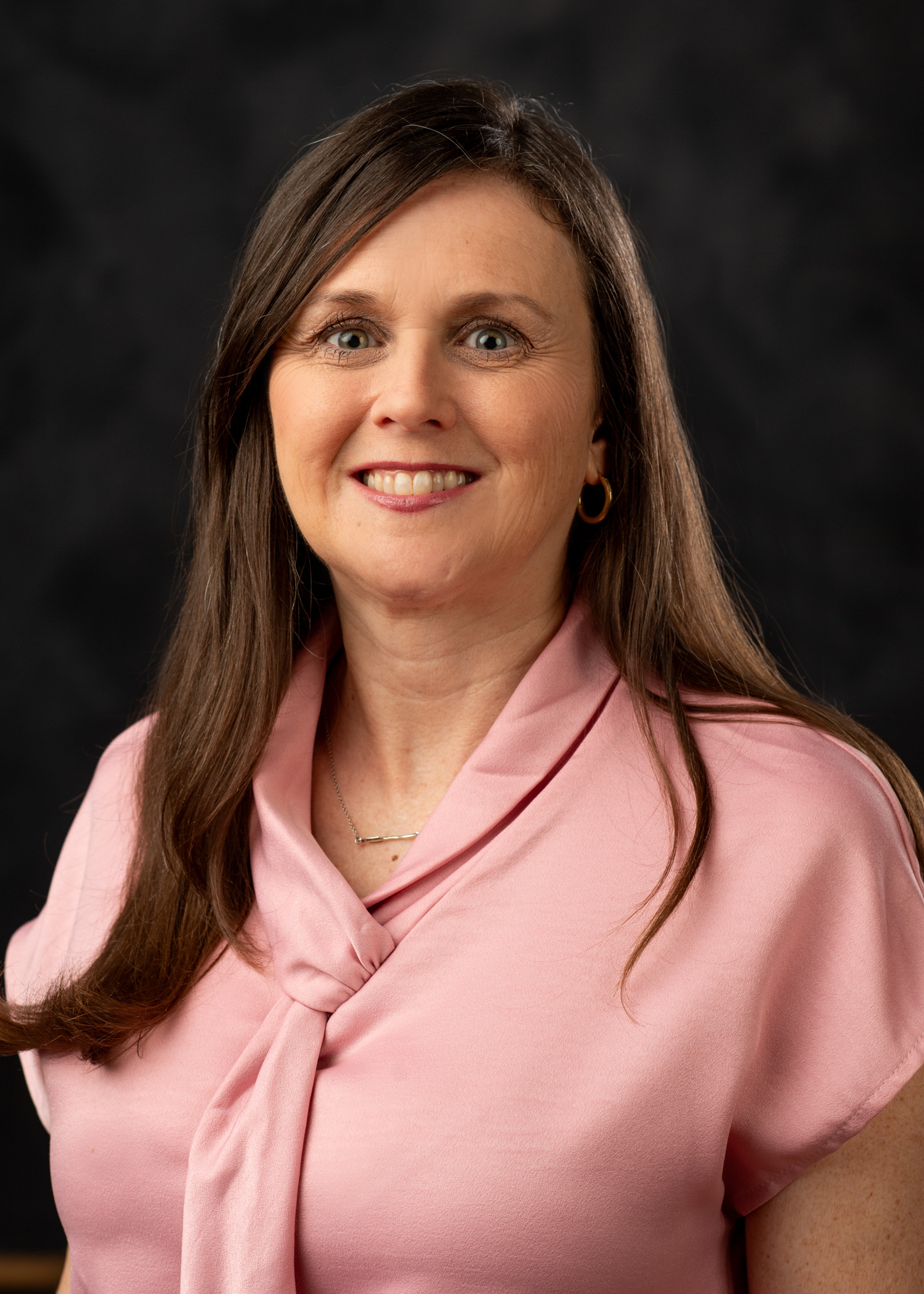 Headshot photo of Deana