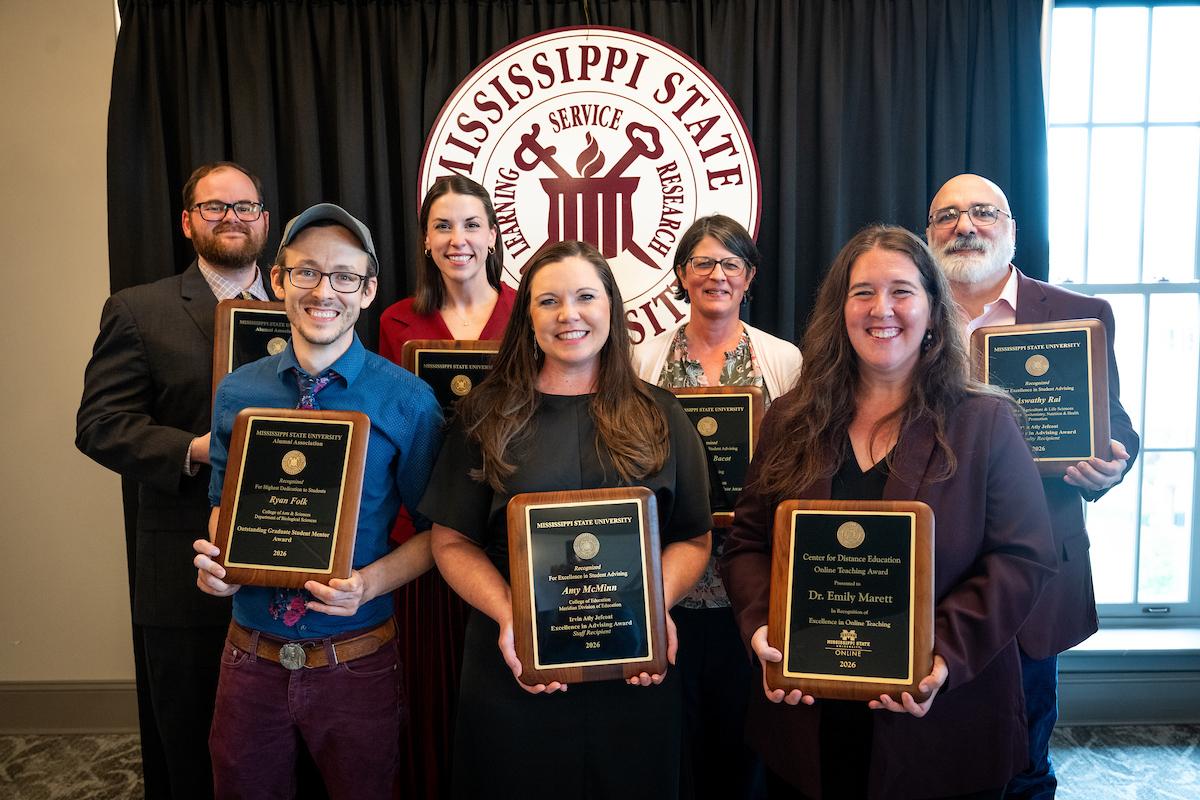 A group photo of MSU faculty and staff receiving prestigious university awards on May 5.