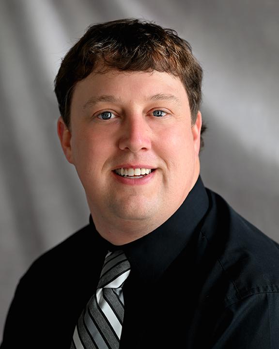 Headshot of Dr. Kaleb Smith